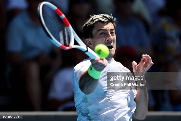 Sebastian Ofner of Austria plays a forehand in his match against Denis Shapovalov of Canada during the 2024 Men's ASB Classic at ASB Tennis Centre on...