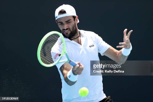 Matteo Berrettini plays a forehand during a training session ahead of the 2024 Australian Open at Melbourne Park on January 09, 2024 in Melbourne,...