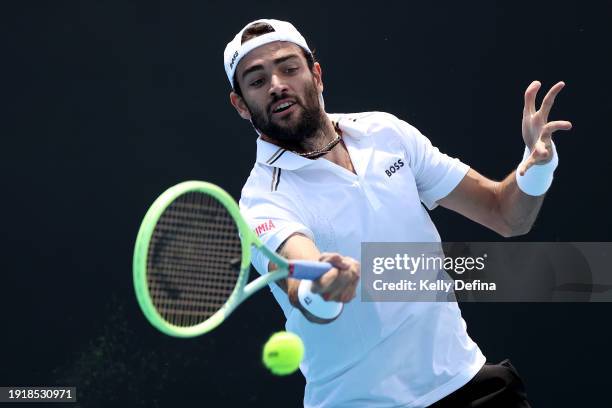 Matteo Berrettini plays a forehand during a training session ahead of the 2024 Australian Open at Melbourne Park on January 09, 2024 in Melbourne,...