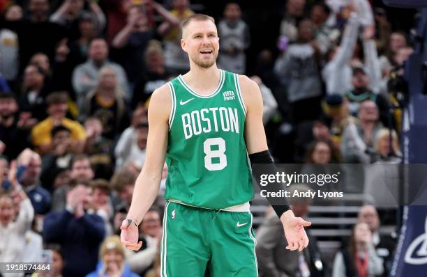 Kristaps Porzingis of the Boston Celtics reacts after being charged with a foul in the final second of the 133-131 loss to the Indiana Pacers at...