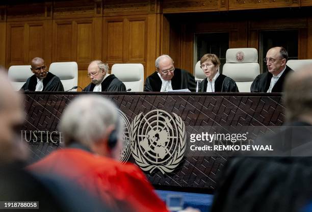 President of the International Court of Justice US lawyer Joan Donoghue confers with colleagues at the court in The Hague on January 12 prior to the...