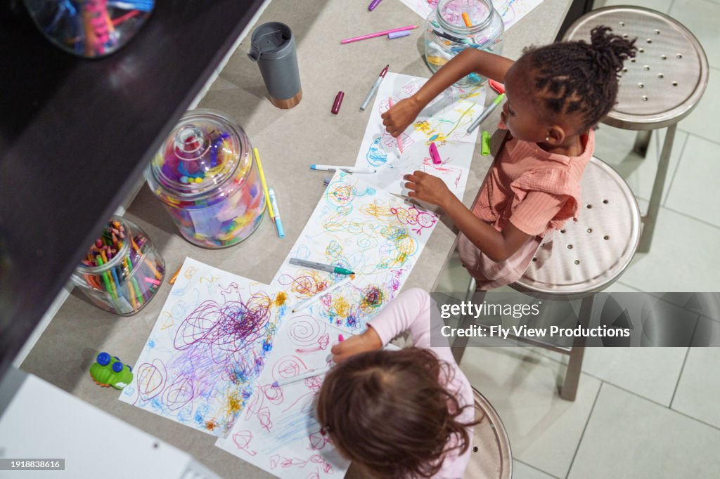 Preschool age girls coloring