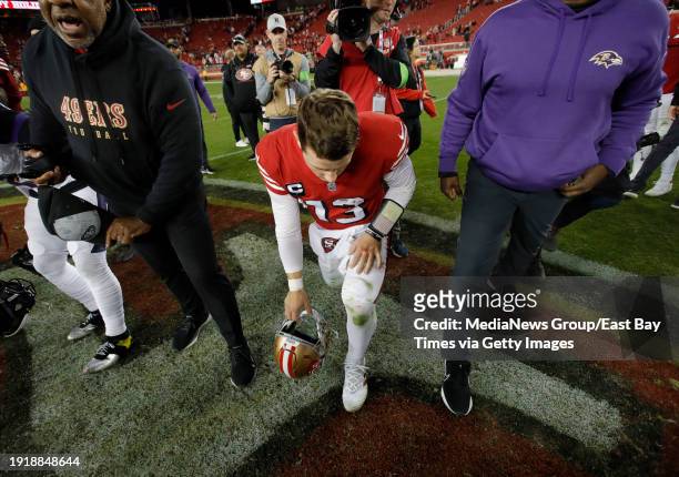 San Francisco 49ers quarterback Brock Purdy prepares to pray after the 49ers 33-19 NFL loss to the Baltimore Ravens at Levis Stadium in Santa Clara,...
