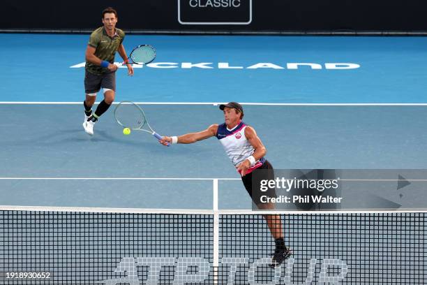 Artem Sitak and Rubin Statham of New Zealand in action in their doubles match against Romain Arnoldo of Monaco and Sam Weissborn of Austria during...