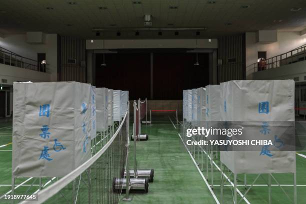 General view shows booths at a polling station ahead of Taiwan's presidential election in Tainan on January 12, 2024.