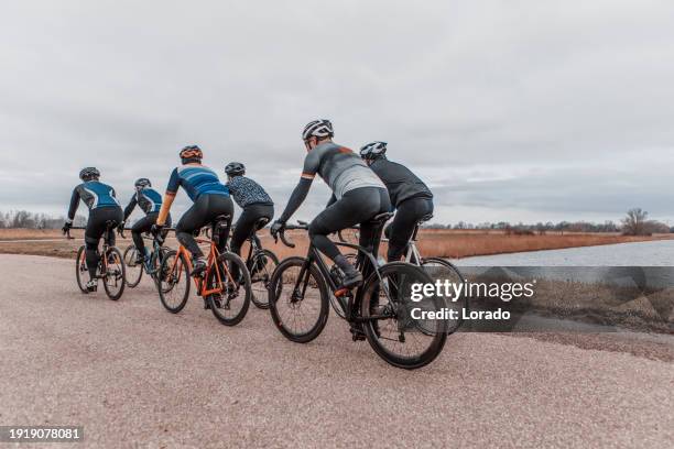 six friends cycling for exercise - wielrennen stockfoto's en -beelden