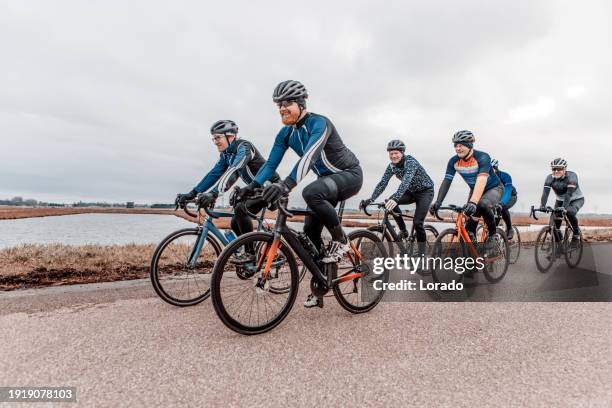 six friends cycling for exercise - cycling team stock pictures, royalty-free photos & images