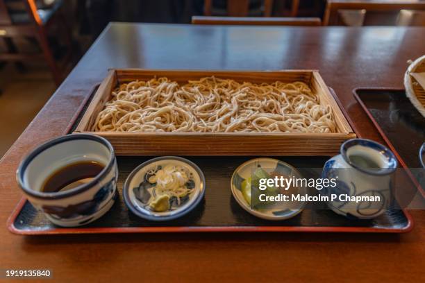 ita soba (buckwheat noodles), traditional yamagata style soba served in a box or tray - yamadera stock pictures, royalty-free photos & images