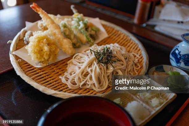 ita soba (buckwheat noodles) and tempura served on a traditional tray. yamagata style soba - yamadera stock pictures, royalty-free photos & images