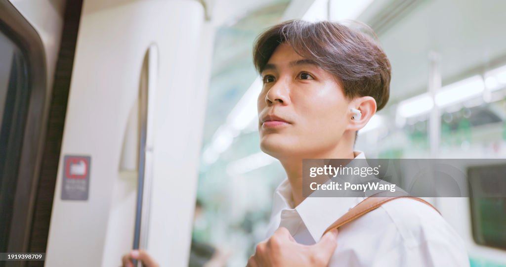 Man listen music with earbuds