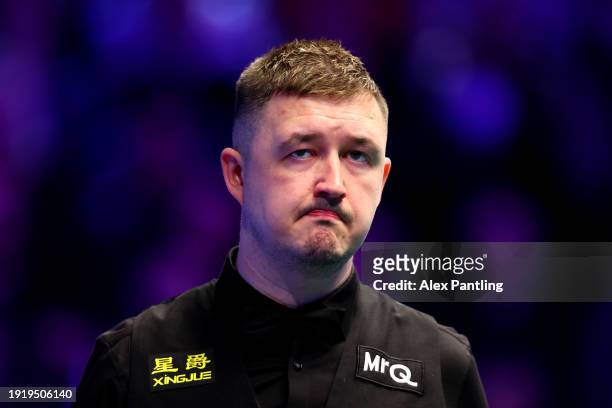 Kyren Wilson of England looks on during the First Round Match between Judd Trump of England and Kyren Wilson of England on Day Three of the MrQ...