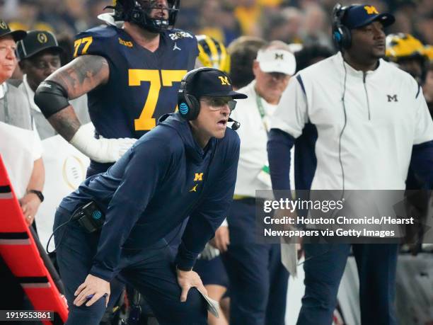 Michigan Wolverines head coach Jim Harbaugh is seen during the national championship NCAA College Football Playoff game at NRG Stadium, Monday, Jan....