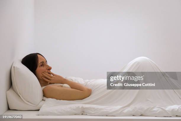 View of the work titled “In Bed”, 2005 by Australian-born artist Ron Mueck at Triennale di Milano on January 09, 2024 in Milan, Italy.