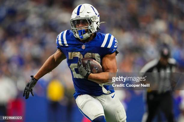Jonathan Taylor of the Indianapolis Colts runs the ball during an NFL football game against the Houston Texans at Lucas Oil Stadium on January 6,...