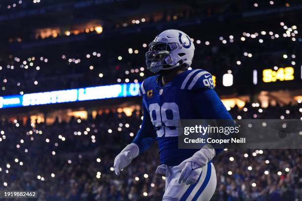 DeForest Buckner of the Indianapolis Colts runs out of the tunnel prior to an NFL football game against the Houston Texans at Lucas Oil Stadium on...