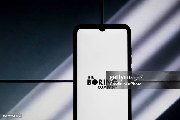 The Boring Company logo is being displayed on a smartphone screen in Athens, Greece, on January 12, 2024.