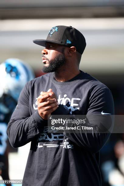 Carolina Panthers offensive coordinator Thomas Brown looks on prior to the game against the Green Bay Packers at Bank of America Stadium on December...