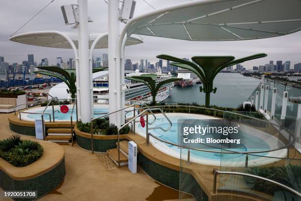 Whirlpool hot tubs at the Hideaway onboard the Royal Caribbean Icon of the Seas cruise ship at PortMiami in Miami, Florida, US, on Thursday, Jan. 11,...