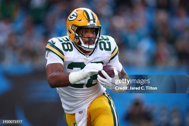 Dillon of the Green Bay Packers carries the ball during the second half of the game against the Carolina Panthers at Bank of America Stadium on...