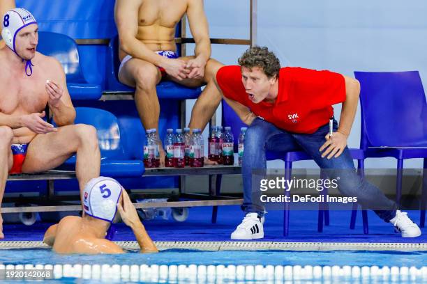 Team Assistant Coach Karrol Baco from SLovakia angry on Tomas Zolovcik of Slovakia during the 2024 European Men's Water Polo Championships...