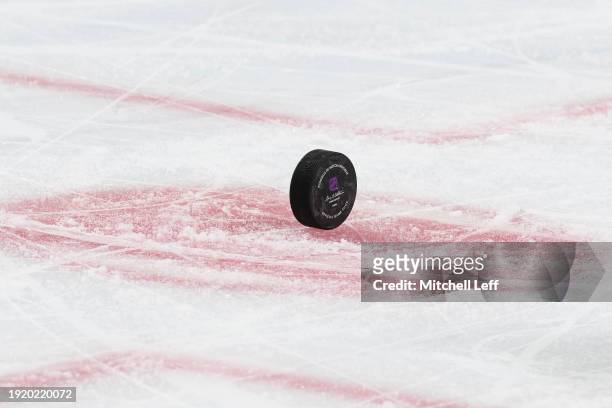 Detailed view of the game puck during the game between the Columbus Blue Jackets and Philadelphia Flyers at the Wells Fargo Center on January 4, 2024...