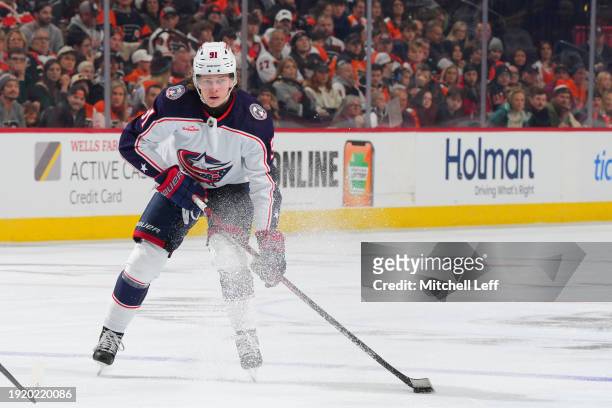 Kent Johnson of the Columbus Blue Jackets controls the puck against the Philadelphia Flyers at the Wells Fargo Center on January 4, 2024 in...