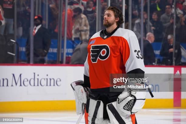 Samuel Ersson of the Philadelphia Flyers looks on prior to the game against the Columbus Blue Jackets at the Wells Fargo Center on January 4, 2024 in...