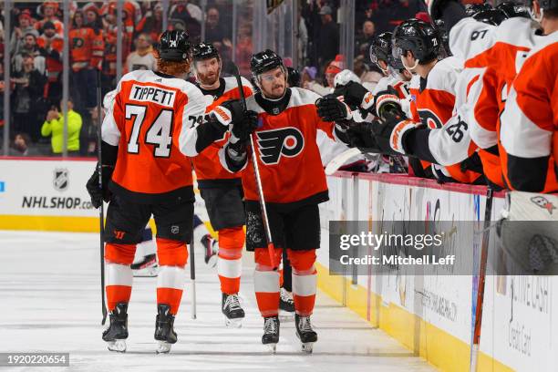 Travis Konecny of the Philadelphia Flyers celebrates with teammates against the Columbus Blue Jackets at the Wells Fargo Center on January 4, 2024 in...