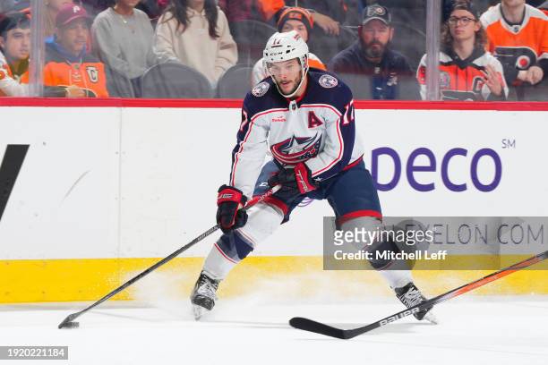 Justin Danforth of the Columbus Blue Jackets controls the puck against the Philadelphia Flyers at the Wells Fargo Center on January 4, 2024 in...