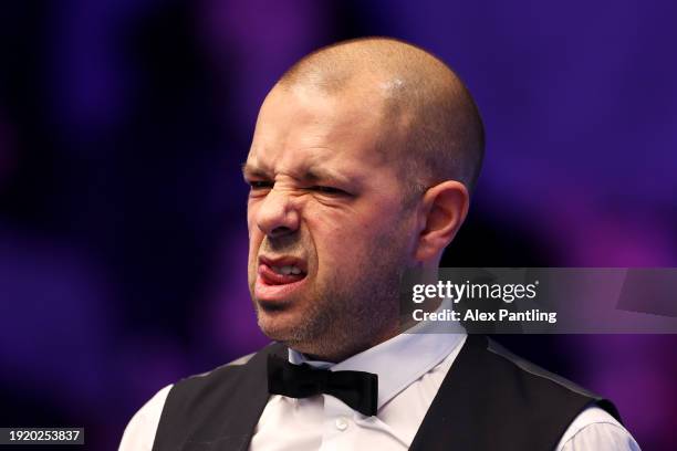 Barry Hawkins of England reacts during the First Round Match between Neil Robertson of England and Barry Hawkins of England on Day Three of the MrQ...