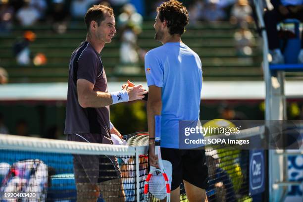 Sir Andy Murray of Great Britain and Dominic Thiem of Austria seen shaking hands during third match of Day 2 of the Care Wellness Kooyong Classic...