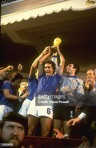 Scirea and Dino Zoff of Italy hold the trophy aloft after the World Cup final against West Germany at the Bernabeu Stadium in Madrid, Spain. Italy...