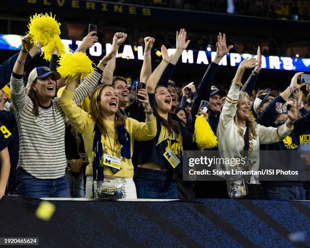 Michigan fans celebrate their victory after the CFP National Championship game between the University of Washington and the University of Michigan at...