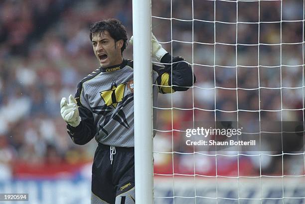 Portuguese goalkeeper Vitor Baia shouts to his team mates during a European Championship match against Croatia at the City Ground in Nottingham,...