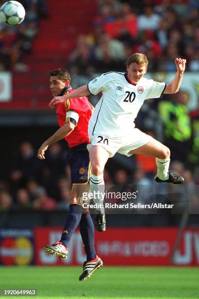 June 13: Ole Gunnar Solskjaer of Norway and Fernando Hierro of Spain challenge during the Uefa Euro 2000 Group C match between Spain and Norway at...