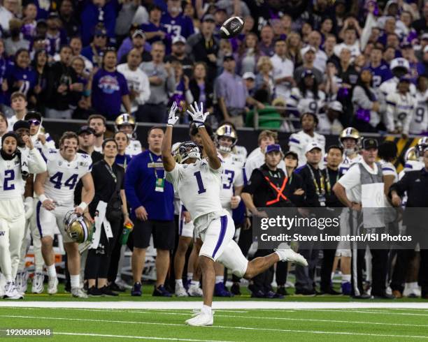 Rome Odunze of the Washington Huskies makes a catch that was called back because of a holding call during the CFP National Championship game between...