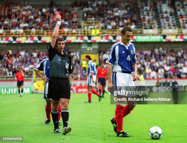 June 21: Slavisa Jokanovic of Yugoslavia is shown red card and sent off by Referee Gilles Veissiere during the UEFA Euro 2000 Group C match between...