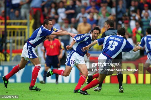 June 21: Slavisa Jokanovic, Dejan Govedarica and Slobodan Komljenovic of Yugoslavia celebrate during the UEFA Euro 2000 Group C match between...