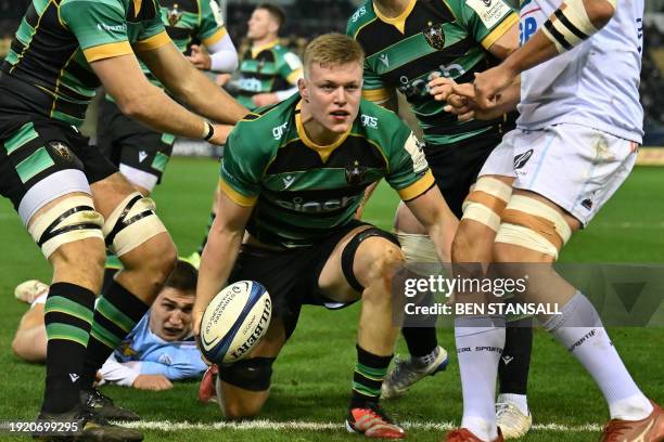 Northampton Saints' English flanker Tom Pearson reacts after scoring his second try during the European Rugby Champions Cup Pool 3 rugby union match...