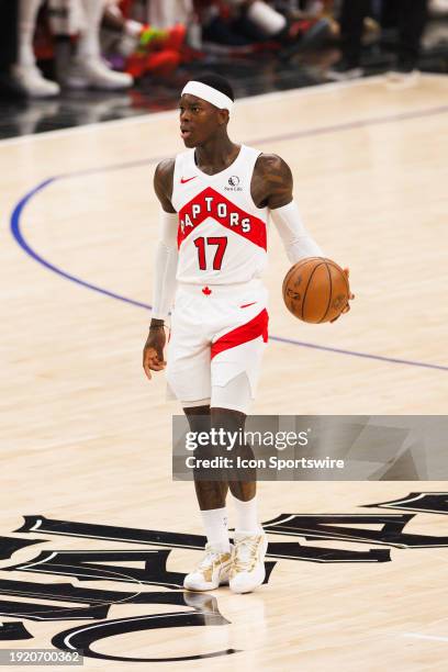 Toronto Raptors guard Dennis Schroder dribbles the ball during a NBA basketball game against the LA Clippers on January 10, 2024 at Crypto.com Arena...
