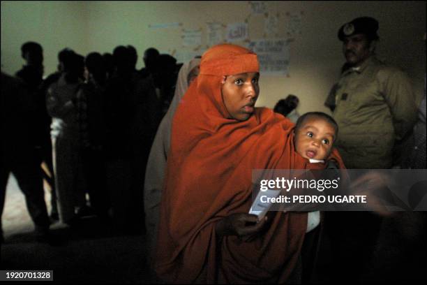 Somaliland woman waits to cast her ballots at a polling station in Hargeisa, Somalia, 31 May 2001 during the constitutional referendum. Ten years...