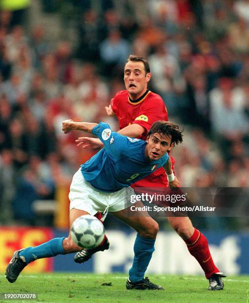 June 14: Philippo Inzaghi of Italy and Yves Vanderhaeghe of Belgium challenge during the Uefa Euro 2000 Group B match between Italy and Belgium at...