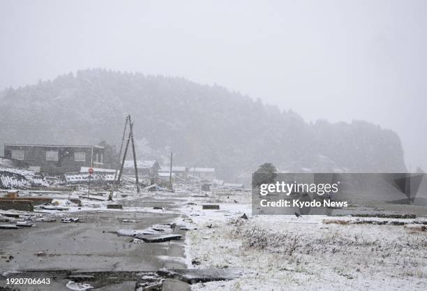 Photo taken on Jan. 13 shows snow dusting a coastal area in Suzu in central Japan's Ishikawa Prefecture, following a strong earthquake on Jan. 1.