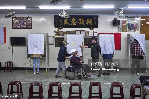 Voters at a polling station in the Wanhua district of Taipei, Taiwan, on Saturday, Jan. 13, 2024. Taiwanese voters are heading to the polls in an...