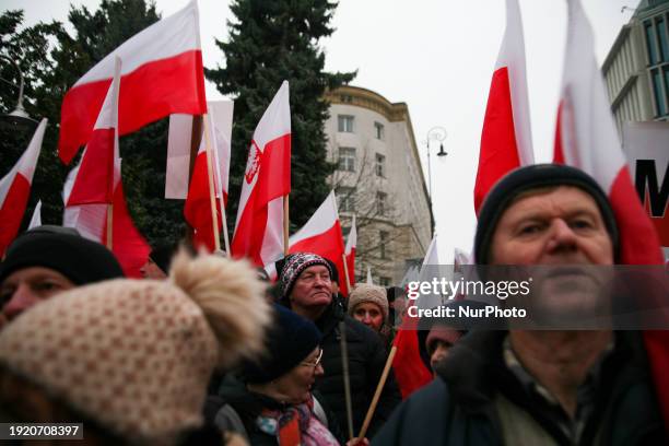 Protesters from the Law and Justice party are demonstrating in front of the Polish Parliament in Warsaw, Poland, on January 11, 2024. The new...