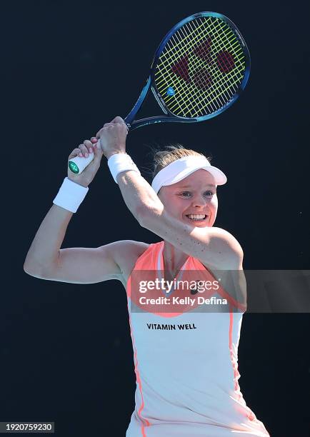 Harriet Dart of Great Britain plays a backhand in their match against Nuria Brancaccio of Italy ahead of the 2024 Australian Open at Melbourne Park...