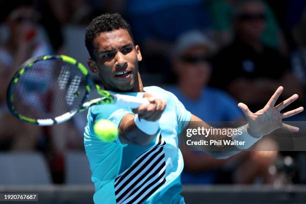 Felix Auger-Aliassime of Canada plays a forehand in his match against Daniel Altmaier of Germany during the 2024 Men's ASB Classic at ASB Tennis...