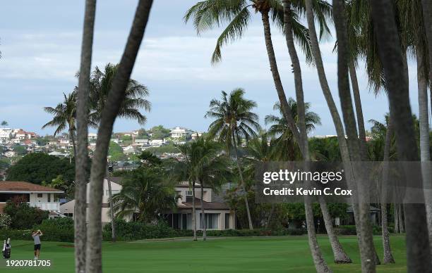 Doug Ghim of the United States plays a shot on the ninth hole during a practice round prior to the Sony Open in Hawaii at Waialae Country Club on...