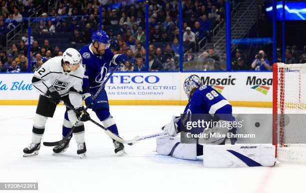 Andrei Vasilevskiy of the Tampa Bay Lightning stops a shot from Trevor Moore of the Los Angeles Kings during a game at Amalie Arena on January 09,...