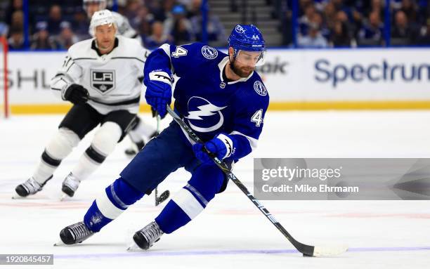 Calvin de Haan of the Tampa Bay Lightning looks to pass in the first period during a game against the Los Angeles Kings at Amalie Arena on January...